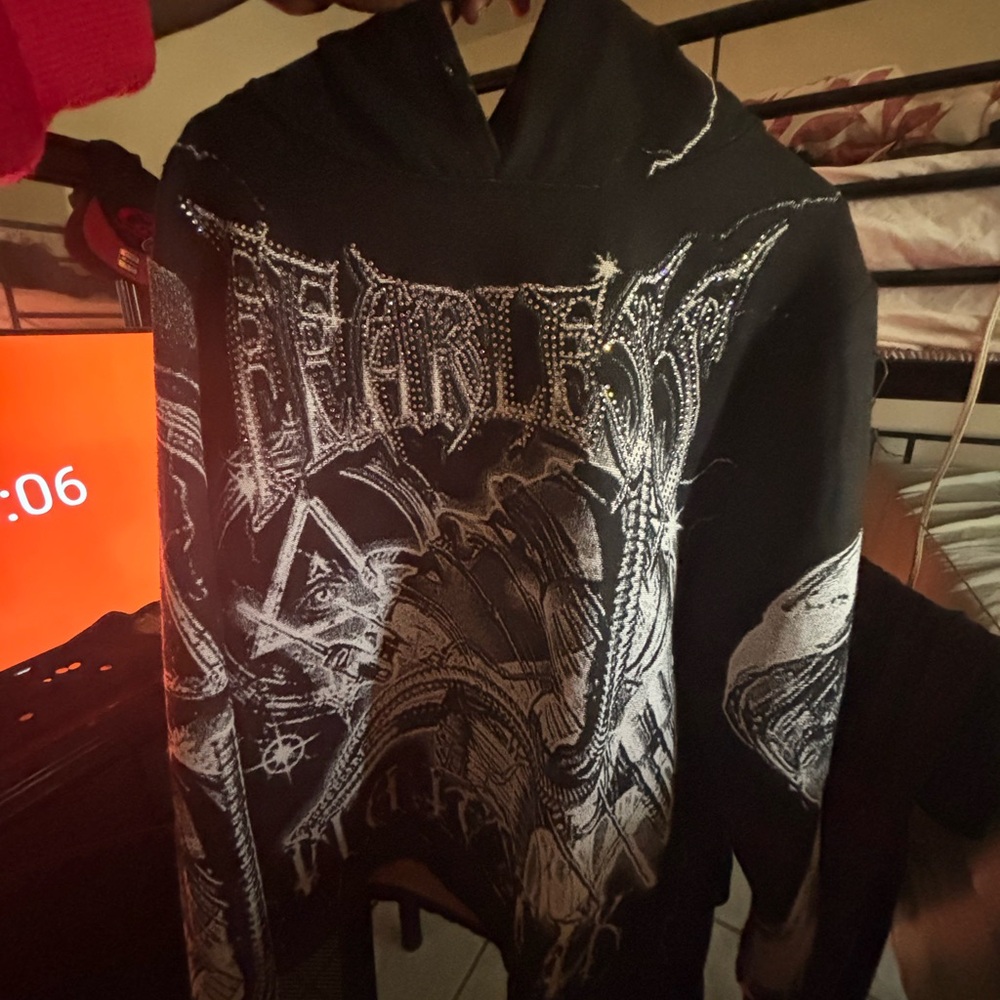 Black and White Turtleneck Sweater with Artistic Flair